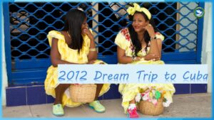 A poster for a Cuba trip with two people wearing traditional costumes